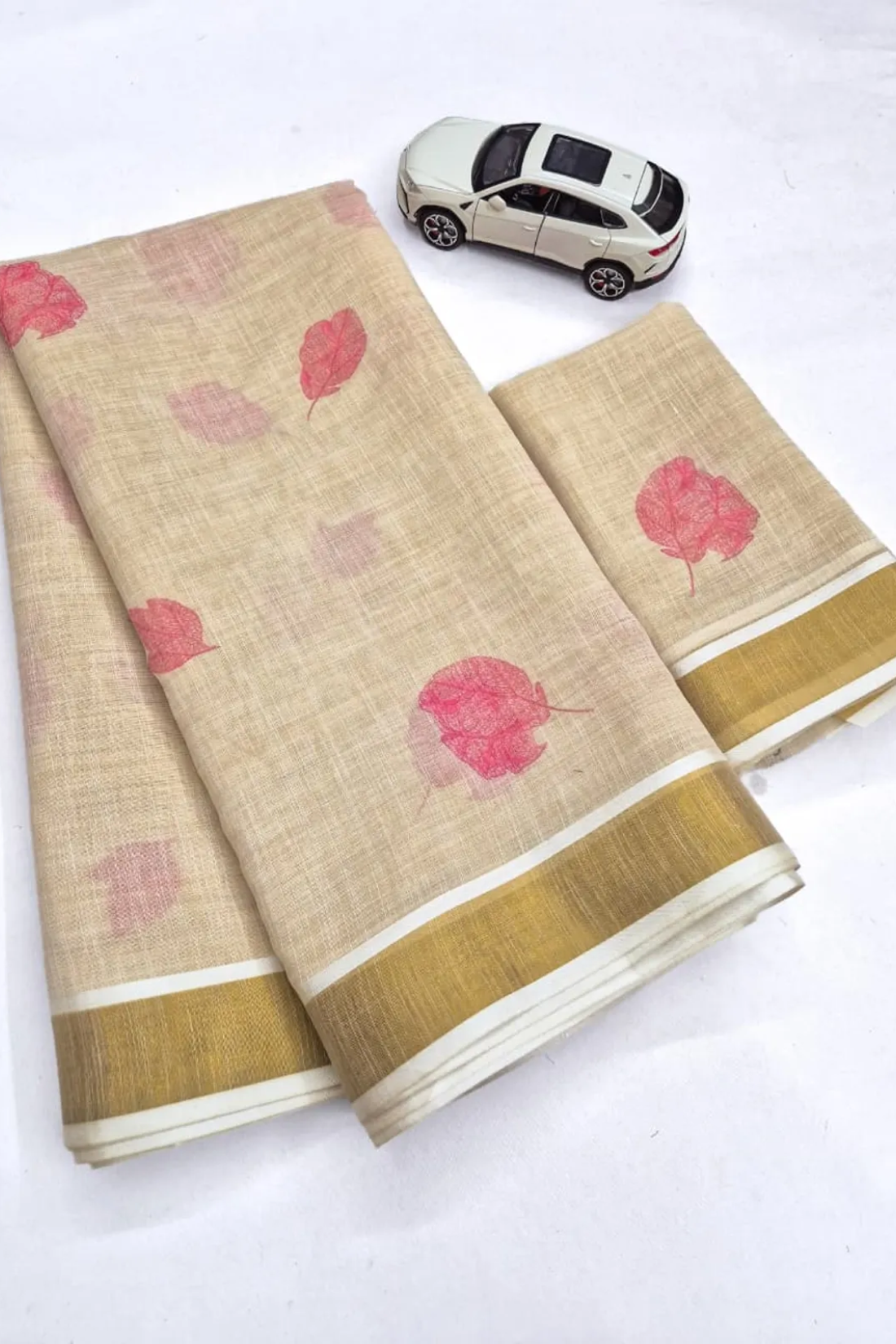 Elegant Chiku Linen Kerala Saree With Digital Floral Print & Gold Jari Border