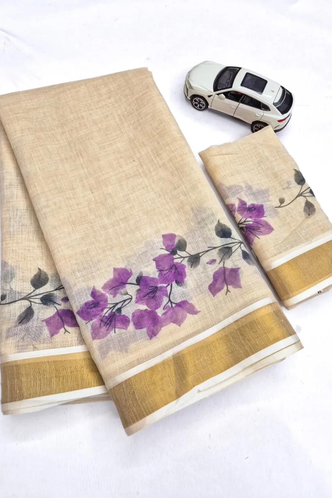 Elegant Chiku Linen Kerala Saree With Digital Floral Print & Gold Jari Border
